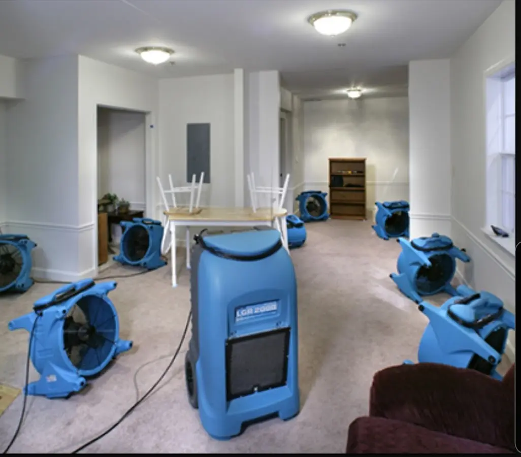 Air movers and dehumidifier setup for Water Damage Restoration in Helena
